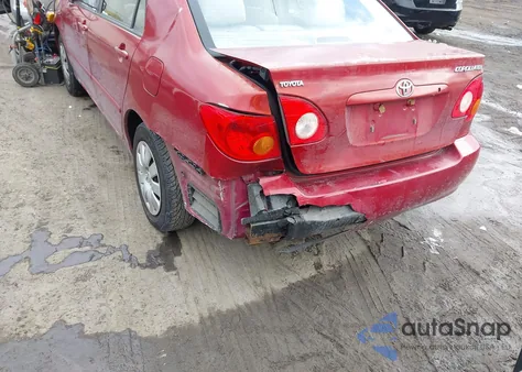 2003 Toyota Corolla Le z USA, uszkodzony, nr VIN JTDBR32EX32007104